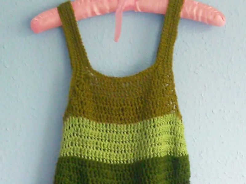 Woman wearing a crochet A-line summer dress