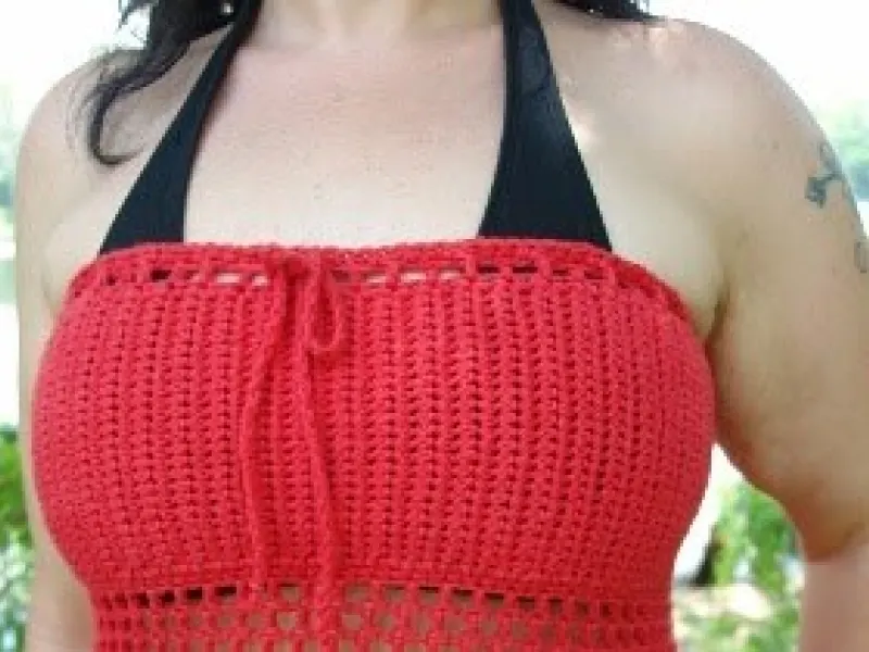 Simple crochet summer dress on a hanger