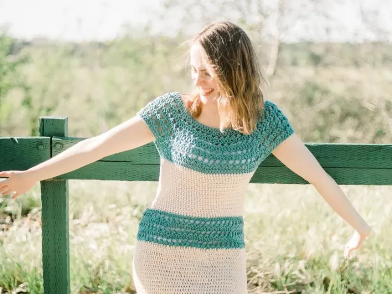 Flowing crochet dress with a loose skirt outdoors