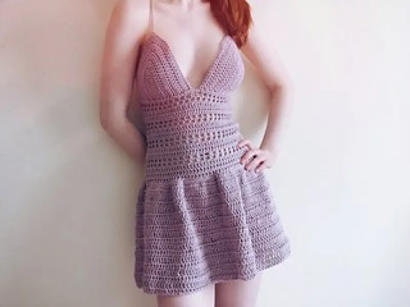 Crochet summer dress in solid color on a model