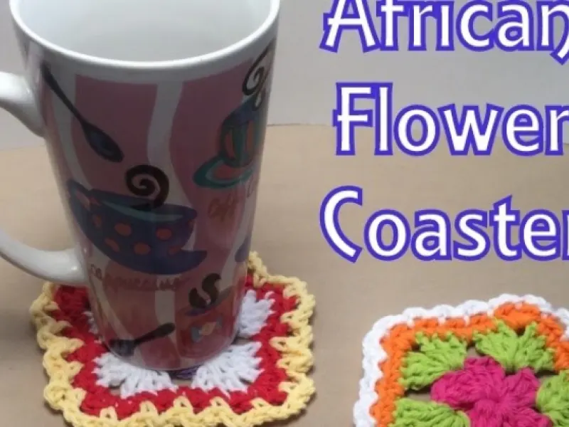 Crochet flower coaster in red, white and blue yarn