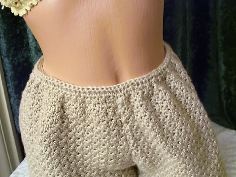 Pair of plain crochet summer shorts on a table