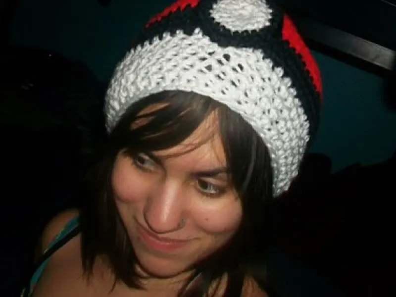 Crochet Pokeball hat with circular white button detail